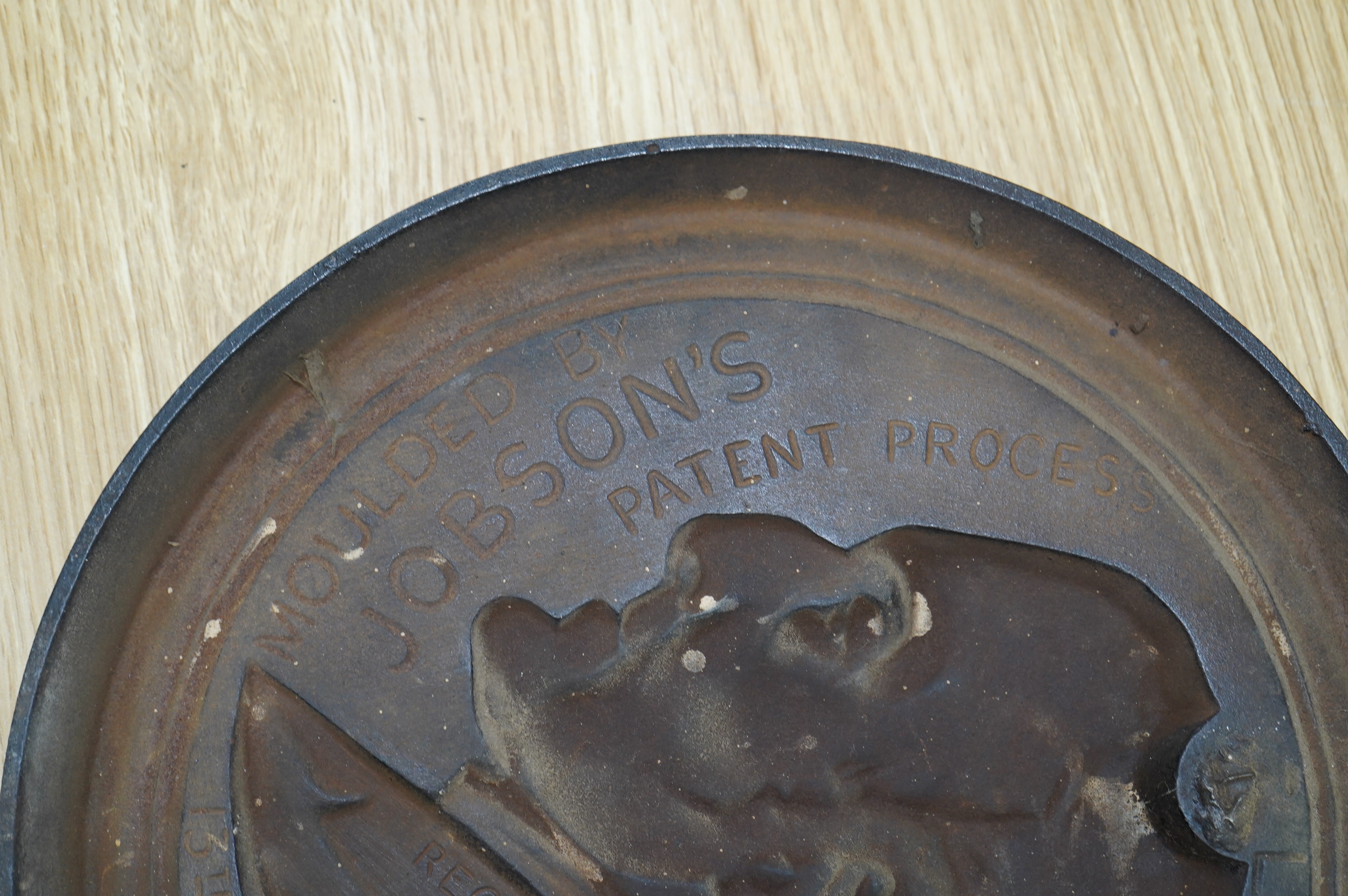 A cast iron profile of the Duke of Wellington, inscribed verso 'Moulded by Jobson's Patent Process, Litchurch, Derby, Registered No. 3, 13th November 1854'. Condition - good
